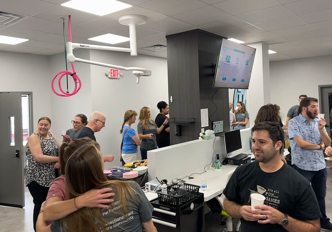 people mingling during Open House for United Vision Pet Partners